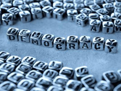 Asymmetric Democracy and Governing