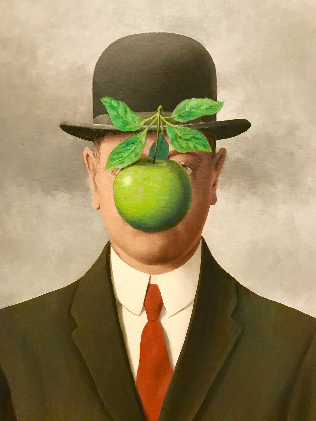 Son of Man, Renè Magritte, 1964, olio su tela, 116 x 89 cm, collezione privata